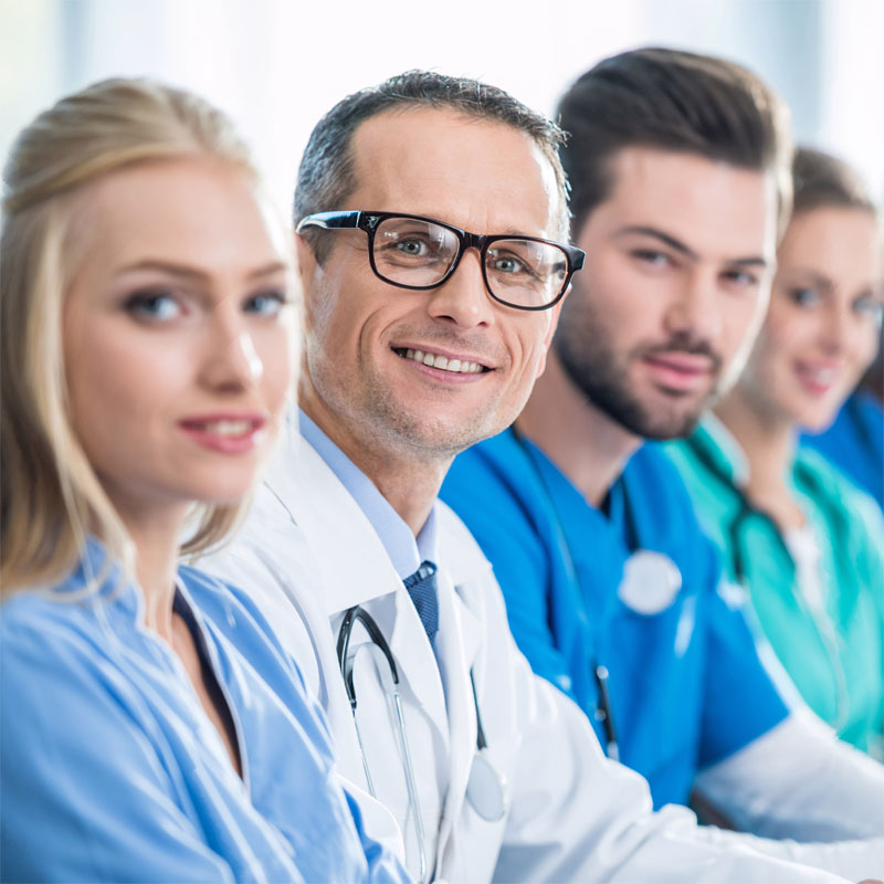 Medical Staff Sitting in Row